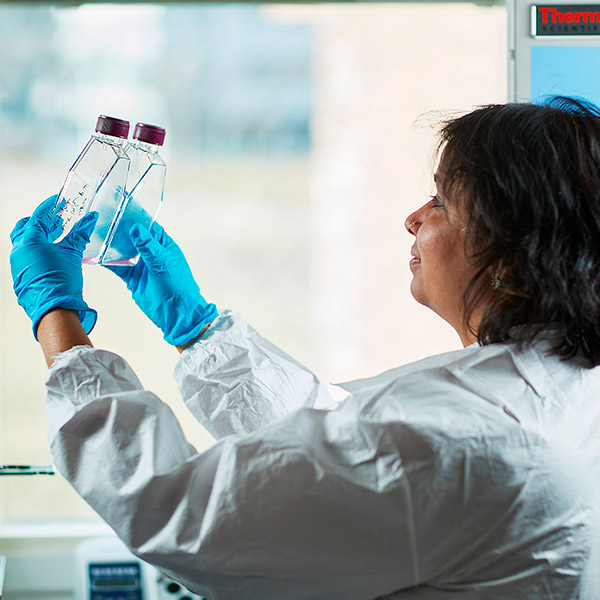 About as at nextera, where you can see a female worker comparing two fluids in a glass